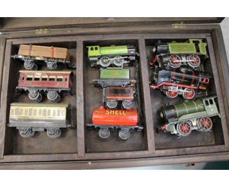 Railway 0 gauge selection including Hornby tank locomotives, carriages and rolling stock, large tinplate bridge and trucks ho