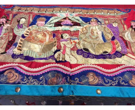 Chinese long embroidered red silk panel c1900s couch and satin stitch figures in garden scene with pagoda and horses etc. Red
