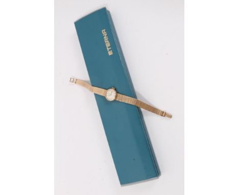 Ladies 9ct gold Eterna wristwatch on gold bark effect articulated bracelet, with original boxCondition report: Weight 23.1g