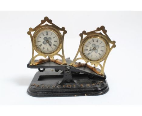 Rare early 20th century wrought iron and brass chess clock / timer by Fattorini &amp; Sons, Bradford, the raised lettering pa