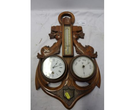 Early 20th century carved walnut combination clock and barometer, carved in the form of an anchor