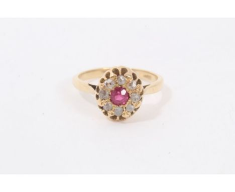 Antique 18ct gold diamond and red stone cluster ring with central round cut red stone, surrounded by eight rose cut diamonds 