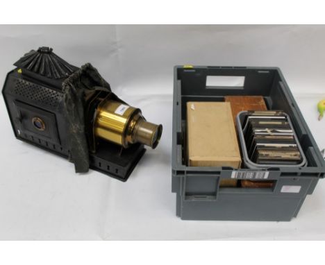 Antique magic lantern with a collection of glass lantern slides