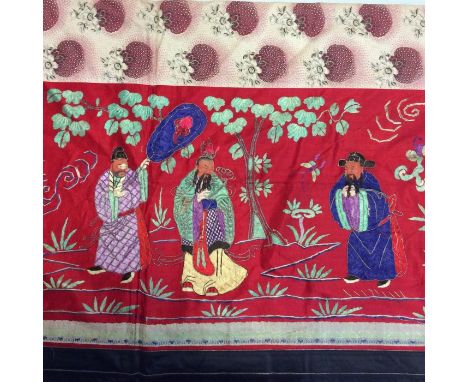 Chinese embroidered red silk panel c19th century couch and satin stitch, figures with painted faces in garden scene with blac