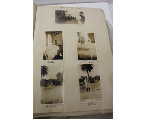 1920s photographs in album including Quetta, India views, people, elephant rides, ox and timber carts, rivers, military sport