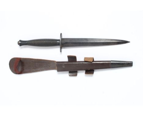 Second World War Third Pattern Fairburn Sykes F-S fighting knife with ribbed hilt, straight crossguard marked with broad arro