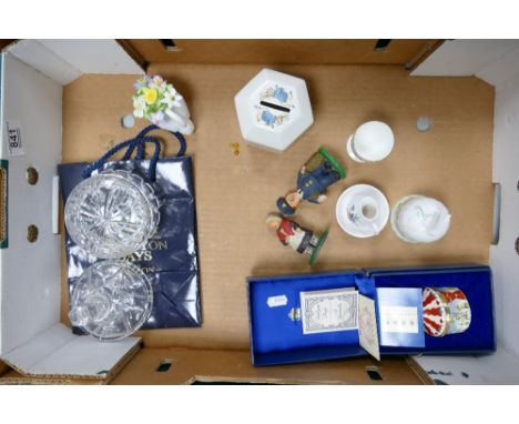 A mixed collection of items to include: Boxed Halcyon Days Enameled Box, Spode Miniature Jug &amp; Bowl, Peter Rabbit money b