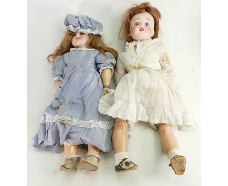 Vintage porcelain dolls: Comprising an Armand Marseille porcelain doll with moving eyes and dimple chin, impressed  370 A M-1