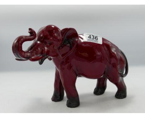 Royal Doulton flambe model of a elephant: with trunk in salute, h17cm. 