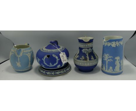 A collection of Dip Blue Wedgwood Jasper Ware to include: Jugs, Teapot, Teapot Stand &amp; staple repaired item(5) 