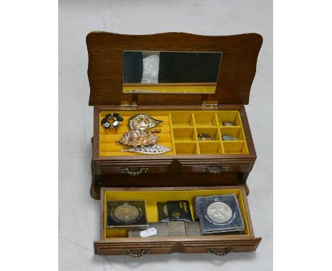 A collection of costume jewellery and items: including Hohner miniature harmonica, commemorative coins, brooches, pendants et