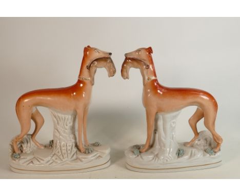 Pair 19th Century Staffordshire Greyhounds: ear damaged to one item, height 28cm(2) 