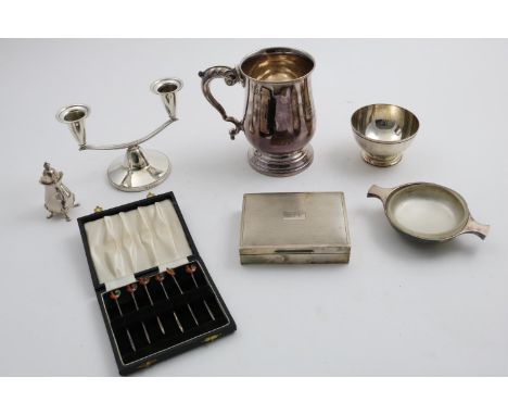 A MISCELLANEOUS LOT: A cigarette box, initialled, a small quaich, a small sugar bowl, a mug, inscribed, a two-light dwarf can