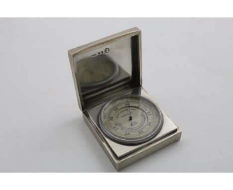 AN EDWARD VIII POCKET ANEROID BAROMETER AND THERMOMETER COMBINED in a square, engine-turned case with a hinged cover, by Aspr
