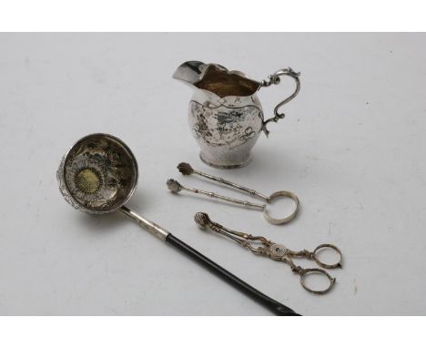 A CREAM JUG decorated in Art Nouveau style, Sheffield 1905, a George III punch ladle, inset with a coin of 1707, a pair of Ge