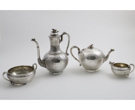 A VICTORIAN FOUR-PIECE TEA AND COFFEE SERVICE Middle Eastern in style with chased formal decoration and spherical bodies, eac