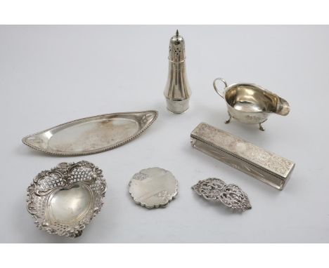 A MIXED LOT:- A late Victorian heart-shaped bonbon dish, a two-piece heart-shaped buckle by Mappin &amp; Webb, a late Victori