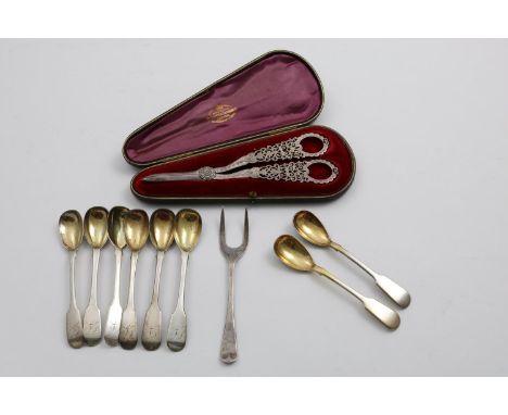 A LATE VICTORIAN CASED PAIR OF GRAPE SHEARS with pierced and engraved decoration, by W. Gibson &amp; J. Langman, London 1894,