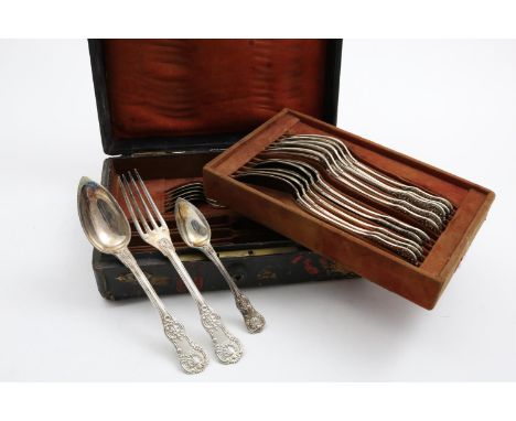 AN EARLY 19TH CENTURY FRENCH PART-SERVICE OF FLATWARE IN A VARIENT OF QUEEN'S PATTERN TO INCLUDE:- Six table spoons, six tabl