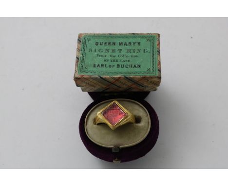 A GOLD SIGNET RING set with a foiled glass intaglio, engraved with the coat of arms believed to be of Mary Stewart and initia