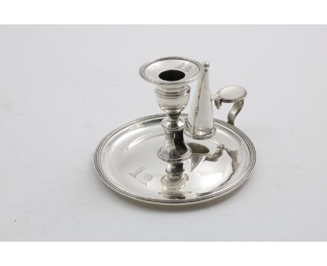 A GEORGE III / IV CIRCULAR CHAMBERSTICK with reeded borders, detachable nozzle and non-matching snuffer, engraved with two cr