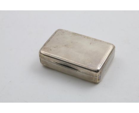 A GEORGE III ENGINE-TURNED SNUFF BOX of rectangular form with rounded corners &amp; edges, gilt interior, probably by Thomas 