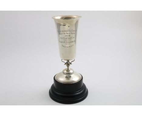 AN EDWARDIAN TROPHY CUP  on a domed foot with a beaker-shaped bowl and an inscription relating to the "Sparkford Vale Harrier