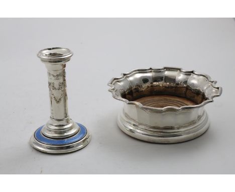 A GEORGE V SINGLE CANDLESTICK with enamelled decoration around the base, maker's mark "P&amp;S", Birmingham 1911 and a plated