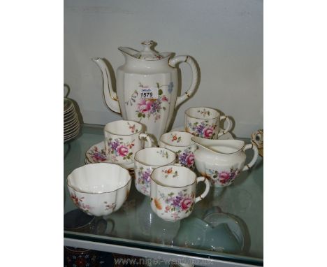 A Royal Crown Derby ''Derby Posies'' Coffee set comprising coffee pot, sugar bowl, milk jug, five cups and six saucers.