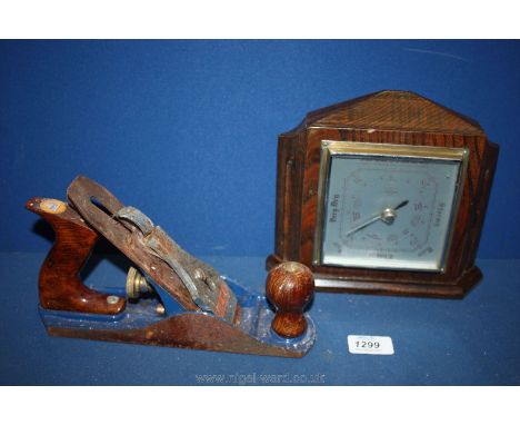 A Hilka Plane (rusty) and an Oak cased wall hanging Barometer.