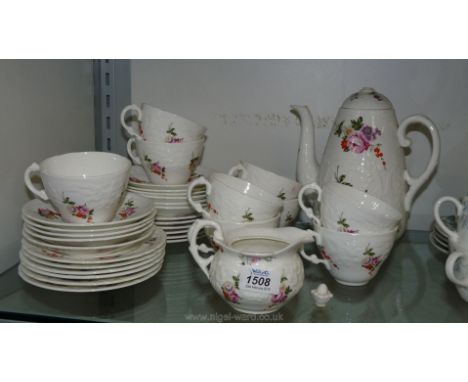 A part Coalport ''Caughley Sprays'' Teaset comprising twelve tea plates, eleven saucers, nine cups, Jug and Coffee Pot (a/f)