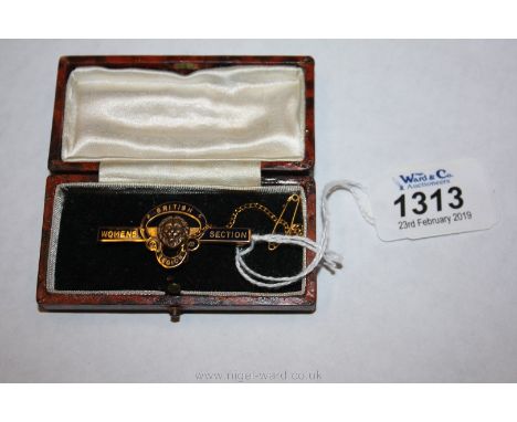 A 9ct gold and enamel women's section British Legion Badge.