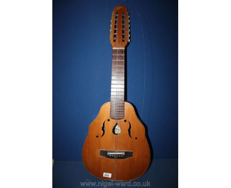 A Spanish bandurria, 12 string, made by Vicente Tatay Thomas of Valencia; Spanish folk instrument cross between a mandolin an