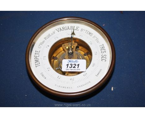A small French gilt metal framed Barometer, 14.5 cm diameter.