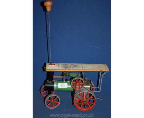 A Mamod Steam Traction Engine, with firebox pan, drive belt and steer rod