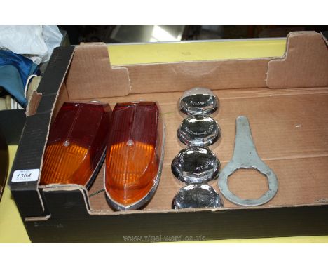 Four chrome MG spinners, spanner and two MG back light cluster assemblies and lenses