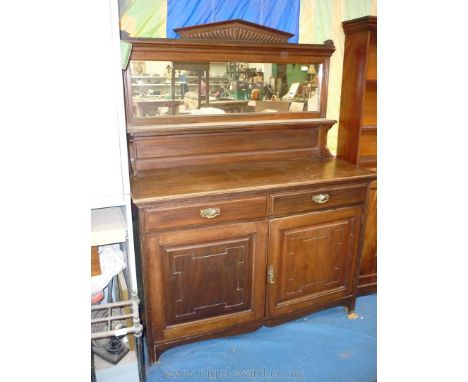 An Edwardian design Mahogany mirrorback Sideboard, with opposing doored cupboards to the base, two frieze drawers over the mi