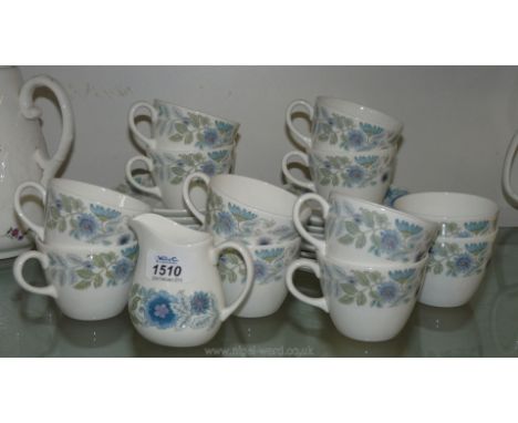 A quantity of Wedgwood 'Clementine' Teaware comprising eleven cups, eight saucers, eight tea  plates, sugar bowl and cream ju