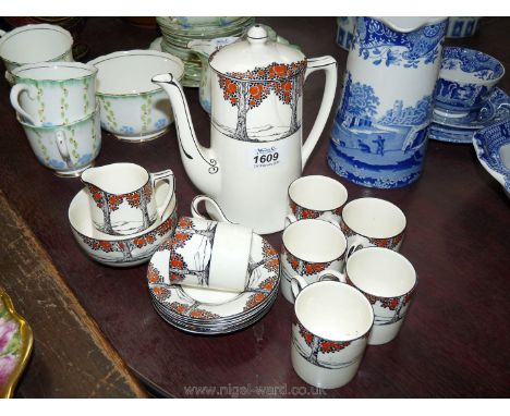 A Crown Ducal ''orange tree'' pattern Coffee set comprising six coffee cans and saucers, milk jug, sugar bowl and coffee pot