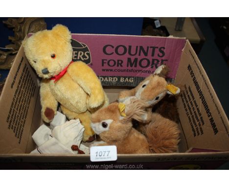 Two classic Steiff squirrels, also a Deans Teddy bear wearing a red ribbon with original cloth bag