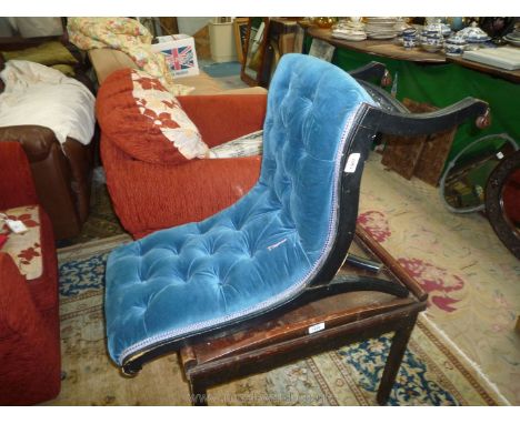 An ebonised framed buttoned blue velvet draylon upholstered Nursing Chair with bobbin turned detail to the front (requires re