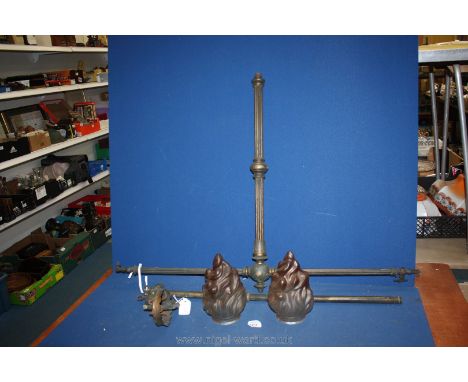 Two old gas light fittings and two glass flame shades.
