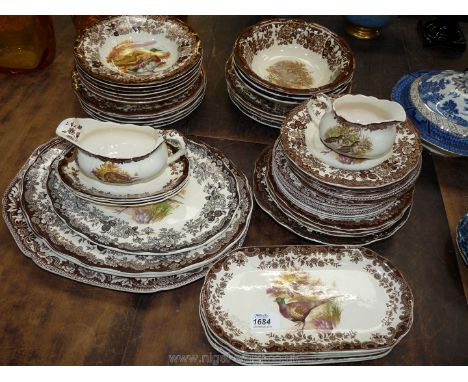 A large quantity of Royal Worcester Palissy game series meat plates, dinner plates, soup bowls and smaller plates.