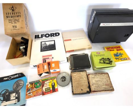 A box of cine equip and glass frames including a Prinz Cabaret IQ 8mm movie projector with instructions, Ilford photographic 