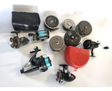 An extensive collection of fishing equipment to include Lures, Line, three boxes of Flies and eleven reels to include an Abu 