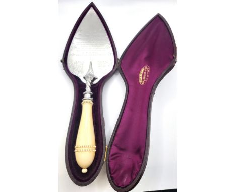 A silver commemorative foundation trowel with bone handle  inscribed Hall &amp; Co Manchester and an engraving of a Sunday Sc