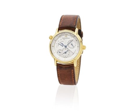 Jaeger-LeCoultre. An 18K gold automatic calendar dual time wristwatch with power reserve indicationJaeger-LeCoultre. Montre b