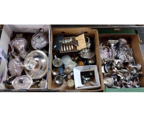 Three boxes of metalware, mostly silver plate to include: coffee pots, teapots, pedestal basket, various cutlery, shoe shaped