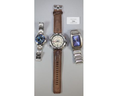 Three modern watches to include; unusual Timex Explorer compass quartz watch with leather strap, a Sekonda Rolex copy steel l