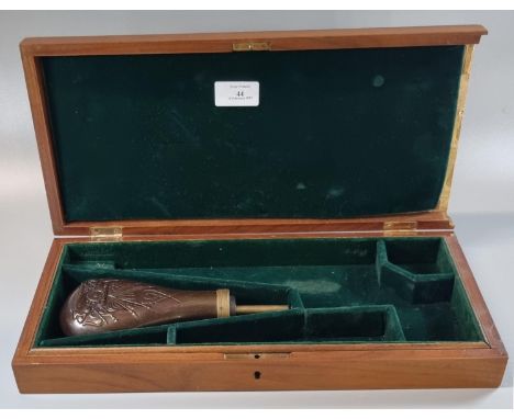 Modern hardwood fitted pistol box together with a repousse copper powder flask.  (2)  (B.P. 21% + VAT) 
